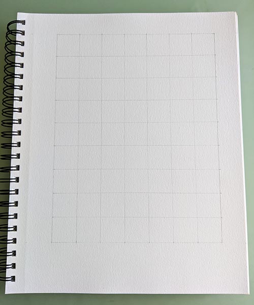 A grid drawn on a page in a sketchbook.