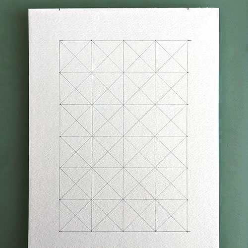 A piece of paper with a 4x6 grid drawn on it. 
